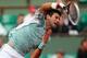 PARIS, FRANCE - JUNE 01: Novak Djokovic of Serbia serves during his Men's Singles match against Grigor Dimitrov of Bulgaria on day seven of the French Open at Roland Garros on June 1, 2013 in Paris, France. (Photo by Clive Brunskill/Getty Images)