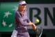 PARIS, FRANCE - JUNE 03: Maria Sharapova of Russia plays a backhand in her Women's Singles match against Sloane Stephens of United States of America during day nine of the French Open at Roland Garros on June 3, 2013 in Paris, France. (Photo by Julian Finney/Getty Images)