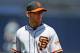 May 16, 2013; Denver, CO, USA; San Francisco Giants second baseman Marco Scutaro (19) fields a ground ball during the eighth inning against the Colorado Rockies at Coors Field. Mandatory Credit: Chris Humphreys-USA TODAY Sports