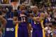 Feb 24, 2013; Dallas, TX, USA; Los Angeles Lakers guard Kobe Bryant (24) talks with center Dwight Howard (12) in the fourth quarter against the Dallas Mavericks at the American Airlines Center. The Lakers beat the Mavs 103-99. Mandatory Credit: Matthew Emmons-USA TODAY Sports