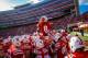 LINCON, NE - NOVEMBER 10: Running back Ameer Abdullah #8 of the Nebraska Cornhuskers jumps atop his teammates before taking the field against the Penn State Nittany Lions at Memorial Stadium on November 10, 2012 in Lincoln, Nebraska. (Photo by Eric Francis/Getty Images)