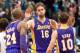 Mar 27, 2013; Minneapolis, MN, USA; Los Angeles Lakers power forward Pau Gasol (16) congratulates teammates Kobe Bryant (24) and Steve Nash (10) at the end of the fourth quarter at Target Center. Lakers won 120-117. Mandatory Credit: Greg Smith-USA TODAY Sports