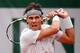 PARIS, FRANCE - JUNE 01: Rafael Nadal of Spain plays a backhand in his Men's Singles match against Fabio Fognini of Italy during day seven of the French Open at Roland Garros on June 1, 2013 in Paris, France. (Photo by Clive Brunskill/Getty Images)