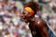 PARIS, FRANCE - JUNE 04: Serena Williams of United States of America celebrates a point during her Women's Singles Quarter-Final match against Svetlana Kuznetsova of Russia on day ten of the French Open at Roland Garros on June 4, 2013 in Paris, France. (Photo by Matthew Stockman/Getty Images)