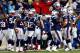 FOXBORO, MA - JANUARY 13: Rob Ninkovich #50 of the New England Patriots celebrates with his team after making an interception in the third quarter against the Houston Texans during the 2013 AFC Divisional Playoffs game at Gillette Stadium on January 13, 2013 in Foxboro, Massachusetts. (Photo by Jared Wickerham/Getty Images)