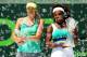 KEY BISCAYNE, FL - MARCH 30: Maria Sharapova of Russia and Serena Williams pose for photographers after the final of the Sony Open at Crandon Park Tennis Center on March 30, 2013 in Key Biscayne, Florida. (Photo by Matthew Stockman/Getty Images)