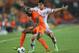 JERUSALEM, ISRAEL - JUNE 09: Ibragim Tsallagov of Russia tries to tackle Bruno Martins Indi of The Netherlands during UEFA European U21 Championships, Group B match between The Netherlands and Russia at Teddy Stadium on June 9, 2013 in Jerusalem, Israel. (Photo by Ian Walton/Getty Images)