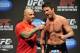 Apr 26, 2013; Newark, NJ, USA; Chael Sonnen (right) is interviewed by Joe Rogan after being weighed in for his light heavyweight title bout against Jon Jones (not pictured) at the Prudential Center. Mandatory Credit: Joe Camporeale-USA TODAY Sports