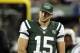 Nov 22, 2012; East Rutherford, NJ, USA; New York Jets quarterback Tim Tebow (15) during the game against the New England Patriots on Thanksgiving at Metlife Stadium. Mandatory Credit: William Perlman/THE STAR-LEDGER via USA TODAY Sports