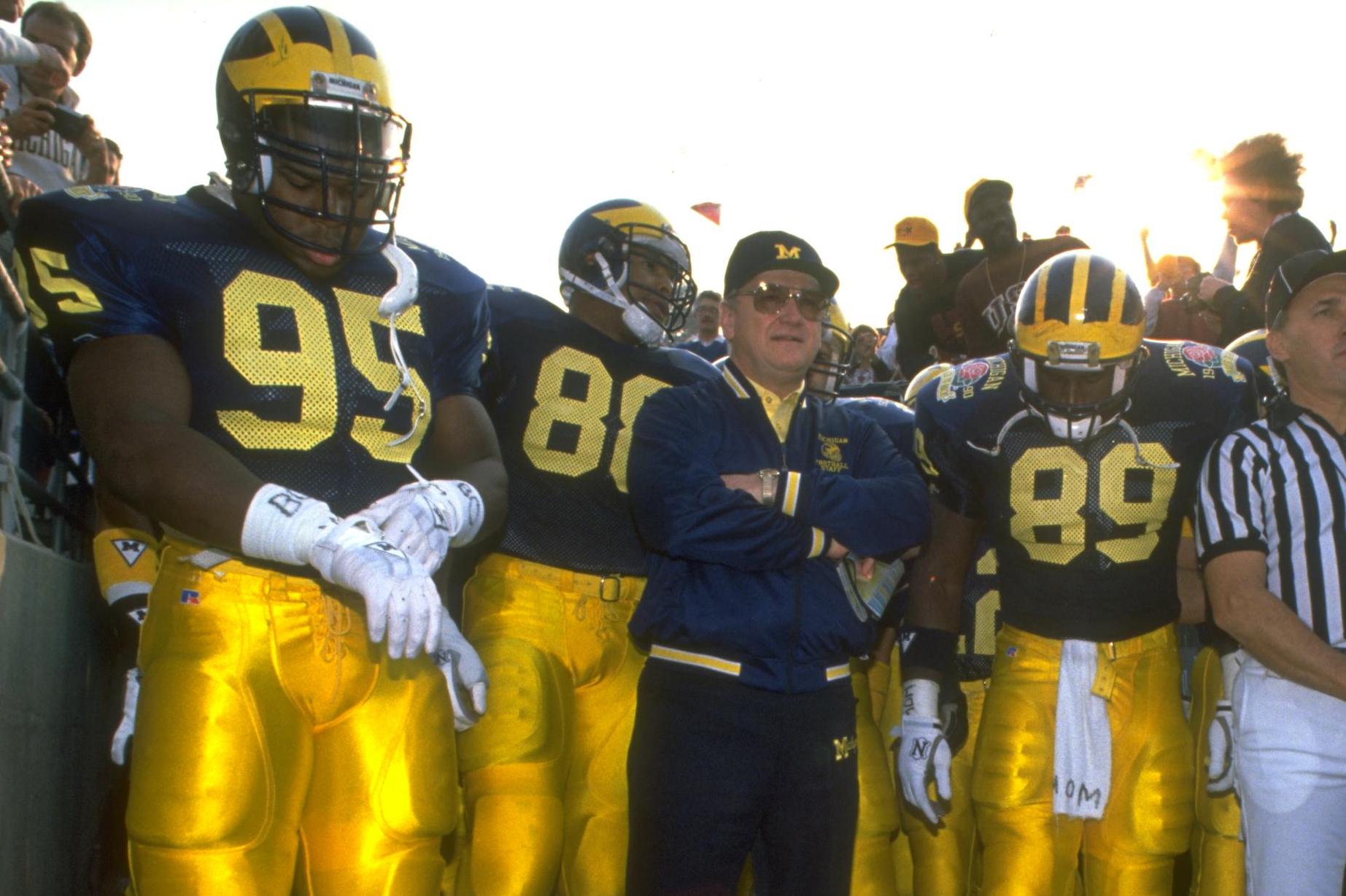 M Den selling Michigan football jerseys with players' names on the back 