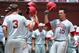 Jun 8, 2013; Tallahassee, FL, USA; Indiana Hoosiers center fielder Kyle Schwarber (10) celebrates with teammates after a home run in the game against the Florida State Seminoles during the Tallahassee super regional of the 2013 NCAA baseball tournament at Dick Howser Stadium. Mandatory Credit: Melina Vastola-USA TODAY Sports