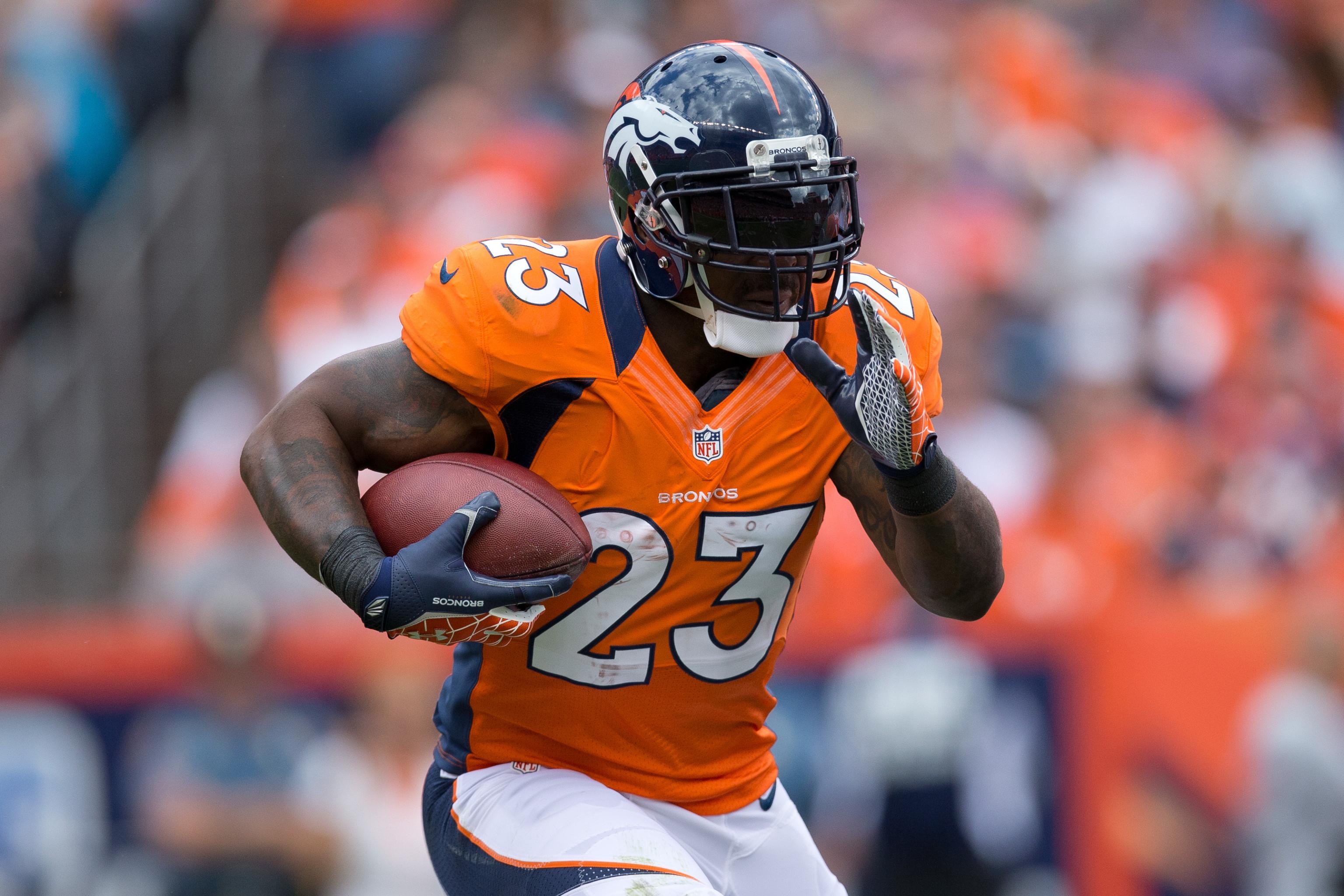 Denver Broncos running back Willis McGahee (23) runs during an NFL