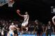 Mar 22, 2013; Dayton, OH, USA; North Carolina State Wolfpack guard Lorenzo Brown (2) lays the ball in against Temple Owls guard Khalif Wyatt (1) during the second round of the 2013 NCAA tournament at University of Dayton Arena. Mandatory Credit: Brian Spurlock-USA TODAY Sports