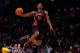 HOUSTON, TX - FEBRUARY 16: Terrence Ross of the Toronto Raptors jumps over a ball kid in his final dunk during the Sprite Slam Dunk Contest part of 2013 NBA All-Star Weekend at the Toyota Center on February 16, 2013 in Houston, Texas. NOTE TO USER: User expressly acknowledges and agrees that, by downloading and or using this photograph, User is consenting to the terms and conditions of the Getty Images License Agreement. (Photo by Scott Halleran/Getty Images)