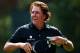 ARDMORE, PA - JUNE 13: Phil Mickelson of the United States tips his visor to the crowd after finishing the tenth hole during Round One of the 113th U.S. Open at Merion Golf Club on June 13, 2013 in Ardmore, Pennsylvania. (Photo by Drew Hallowell/Getty Images)
