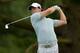 ARDMORE, PA - JUNE 13: Rory McIlroy of Northern Ireland hits his tee shot on the ninth hole during Round One of the 113th U.S. Open at Merion Golf Club on June 13, 2013 in Ardmore, Pennsylvania. (Photo by Drew Hallowell/Getty Images)