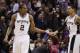 Jan 13, 2012; San Antonio, TX, USA; San Antonio Spurs forward Kawhi Leonard (2) celebrates a basket with guard Danny Green (4) during the second half against the Portland Trail Blazers at the AT&T Center. The Spurs won 99-83. Mandatory Credit: Soobum Im-USA TODAY Sports