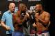 Jun 14, 2013; Winnipeg, Manitoba, Canada; Rashad Evans and Dan Henderson square off during the weigh in at UFC 161 at the MTS Center. Mandatory Credit: Bruce Fedyck-USA TODAY Sports