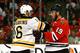 CHICAGO, IL - JUNE 12: Kaspars Daugavins #16 of the Boston Bruins argues with Jonathan Toews #19 of the Chicago Blackhawks in Game One of the NHL 2013 Stanley Cup Final at United Center on June 12, 2013 in Chicago, Illinois. (Photo by Bruce Bennett/Getty Images)