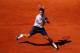 PARIS, FRANCE - JUNE 04: Roger Federer of Switzerland plays a forehand in his Men's Singles quarter final match against Jo-Wilfried Tsonga of France during day ten of the French Open at Roland Garros on June 4, 2013 in Paris, France. (Photo by Clive Brunskill/Getty Images)