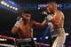 Mikey Garcia (left) dominated JuanMa Lopez from start to finish.