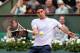 PARIS, FRANCE - MAY 26: Roger Federer of Switzerland plays a forehand during his Men's Singles match against Pablo Carreno-Busta of Spain during day one of the French Open at Roland Garros on May 26, 2013 in Paris, France. (Photo by Clive Brunskill/Getty Images)