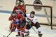 Dupuis (in the white jersey) competing in her final Clarkson Cup (image by Brandon Taylor)