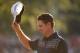 ARDMORE, PA - JUNE 16: Justin Rose of England tips his hat after putting on the 18th hole to complete the final round of the 113th U.S. Open at Merion Golf Club on June 16, 2013 in Ardmore, Pennsylvania. (Photo by Ross Kinnaird/Getty Images)