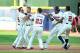 ATLANTA, GA - JUNE 15: Freddie Freeman #5 of the Atlanta Braves is mobbed by teammates after knocking in the game-winning run in the ninth inning against the San Francisco Giants at Turner Field on June 15, 2013 in Atlanta, Georgia. (Photo by Scott Cunningham/Getty Images)
