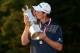 ARDMORE, PA - JUNE 16: Justin Rose of England celebrates with the U.S. Open trophy after winning the 113th U.S. Open at Merion Golf Club on June 16, 2013 in Ardmore, Pennsylvania. (Photo by Andrew Redington/Getty Images)