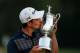 ARDMORE, PA - JUNE 16: Justin Rose of England kisses the U.S. Open trophy after winning the 113th U.S. Open at Merion Golf Club on June 16, 2013 in Ardmore, Pennsylvania. (Photo by Scott Halleran/Getty Images)