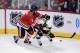 Jun 15, 2013; Chicago, IL, USA; Chicago Blackhawks defenseman Brent Seabrook (7) is checked by Boston Bruins left wing Brad Marchand (63) during the third period in game two of the 2013 Stanley Cup Final at the United Center. Mandatory Credit: Scott Stewart-USA TODAY Sports