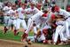 Jun 9, 2013; Tallahassee, FL, USA; Indiana Hoosiers players celebrate after winning the game against the Florida State Seminoles during the Tallahassee super regional of the 2013 NCAA baseball tournament at Dick Howser Stadium. Mandatory Credit: Melina Vastola-USA TODAY Sports