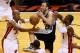 MIAMI, FL - JUNE 18: Manu Ginobili #20 of the San Antonio Spurs loses the ball as he drives between Ray Allen #34 and Dwyane Wade #3 of the Miami Heat in overtime during Game Six of the 2013 NBA Finals at AmericanAirlines Arena on June 18, 2013 in Miami, Florida. NOTE TO USER: User expressly acknowledges and agrees that, by downloading and or using this photograph, User is consenting to the terms and conditions of the Getty Images License Agreement. (Photo by Kevin C. Cox/Getty Images)