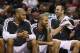 Dec 7, 2012; San Antonio, TX, USA; San Antonio Spurs players (from left) Tim Duncan and Tony Parker and Manu Ginobili watch from the bench during the second half against the Houston Rockets at the AT&T Center. The Spurs won 114-92. Mandatory Credit: Soobum Im-USA TODAY Sports