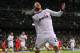 MADRID, SPAIN - MARCH 16: Gonzalo Higuain of Real Madrid CF celebrates after scoring Real's 4th goal during the La Liga match between Real Madrid CF and RCD Mallorca at estadio Santiago Bernabeu on March 16, 2013 in Madrid, Spain. (Photo by Denis Doyle/Getty Images)