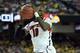 Apr 6, 2013; Atlanta, GA, USA; Louisville Cardinals center Gorgui Dieng (10) pulls in a rebound against the Wichita State Shockers in the first half of the semifinals during the 2013 NCAA mens Final Four at the Georgia Dome. Mandatory Credit: Robert Deutsch-USA TODAY Sports