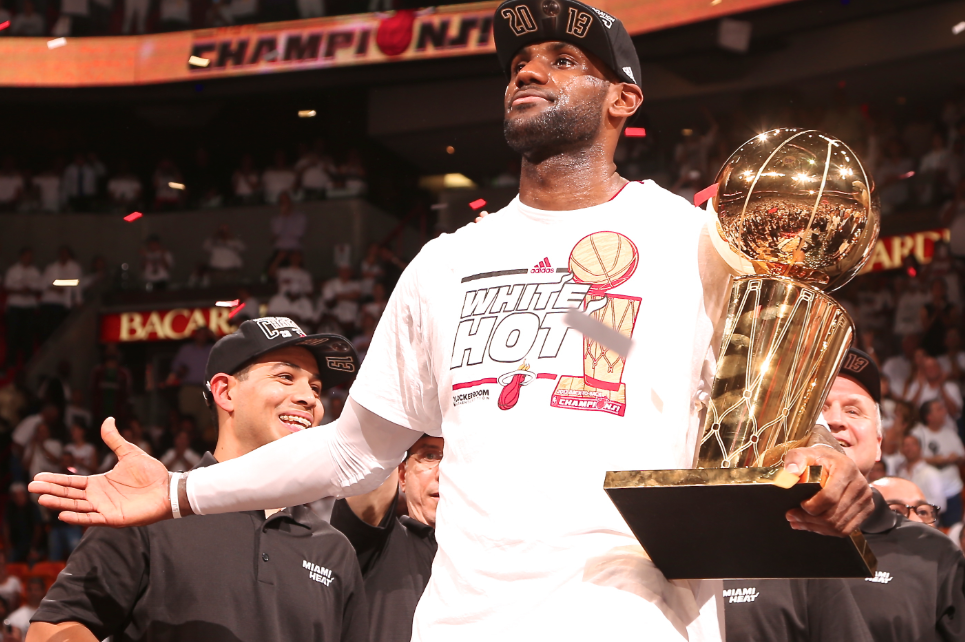 LeBron James & Dwyane Wade with the 2012 NBA Finals & MVP Trophies