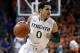 Mar 6, 2013; Coral Gables, FL, USA; Miami Hurricanes guard Shane Larkin (0) dribbles the ball against the Georgia Tech Yellow Jackets in the first half at the BankUnited Center. Mandatory Credit: Robert Mayer-USA TODAY Sports