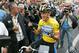 CORBEIL-ESSONNES, FRANCE - JULY 24: Lance Armstrong of the USA riding for the Discovery Channel team, shows seven fingers (meaning seven victories) before Stage 21 of the Tour de France between Corbeille-Essones and The Champs Elysees on July 24, 2005 in Paris, France. (Photo by Robert Laberge/Getty Images)
