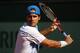 PARIS, FRANCE - MAY 25: Tommy Haas of Germany plays a forehand against Ivan Navarro of Spain during their men's singles third round qualifying match for the French Open at Roland Garros on May 25, 2012 in Paris, France. (Photo by Dan Istitene/Getty Images)