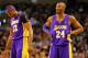BOSTON, MA - FEBRUARY 7: Kobe Bryant #24 and Dwight Howard #12 of the Los Angeles Lakers look on following a foul against the Boston Celtics during the game on February 7, 2013 at TD Garden in Boston, Massachusetts. NOTE TO USER: User expressly acknowledges and agrees that, by downloading and or using this photograph, User is consenting to the terms and conditions of the Getty Images License Agreement. (Photo by Jared Wickerham/Getty Images)