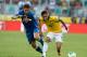 SALVADOR, BRAZIL - JUNE 22: Neymar of Brazil competes with Christian Maggio of Italy during the FIFA Confederations Cup Brazil 2013 Group A match between Italy and Brazil at Estadio Octavio Mangabeira (Arena Fonte Nova Salvador) on June 22, 2013 in Salvador, Brazil. (Photo by Claudio Villa/Getty Images)