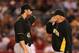 ANAHEIM, CA - JUNE 21: Pitching coach Ray Searage #54 of the Pittsburgh Pirates talks with pitcher Gerrit Cole #45 on the mound in the seventh inning during the MLB game against the Los Angeles Angels of Anaheim at Angel Stadium of Anaheim on June 21, 2013 in Anaheim, California. (Photo by Victor Decolongon/Getty Images)