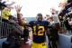 ANN ARBOR, MI - NOVEMBER 17: Devin Gardner #12 of the Michigan Wolverines leaves the field high giving fans after a 42-17 victory over the Iowa Hawkeyes at Michigan Stadium on November 17, 2012 in Ann Arbor, Michigan. (Photo by Gregory Shamus/Getty Images)