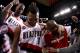 PORTLAND, OR - APRIL 23: Brandon Roy #7 of the Portland Trail Blazers celebrates with teammates Marcus Camby #23 and Armon Johnson #1 after overcoming a 23 point deficit to defeat the of the Dallas Mavericks 84-82 in Game Four of the Western Conference Quarterfinals in the 2011 NBA Playoffs on April 23, 2011 at the Rose Garden in Portland, Oregon. NOTE TO USER: User expressly acknowledges and agrees that, by downloading and or using this photograph, User is consenting to the terms and conditions of the Getty Images License Agreement. (Photo by Jonathan Ferrey/Getty Images)