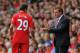 LIVERPOOL, ENGLAND - AUGUST 26: Liverpool Manager Brendan Rogers encourages Fabio Borini of Liverpool during the Barclays Premier League match between Liverpool and Manchester City at Anfield on August 26, 2012 in Liverpool, England. (Photo by Michael Regan/Getty Images)