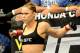 Feb 23, 2013; Anaheim, CA, USA; Ronda Rousey gets ready for her UFC women's world bantamweight championship bout against Liz Carmouche at the Honda Center. Rousey won in the first round. Mandatory Credit: Jayne Kamin-Oncea-USA TODAY Sports