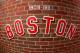 April 20, 2012; Boston, MA, USA; Historical logos on display under the grandstands during the 100th anniversary celebration at Fenway Park. Mandatory Credit: Greg M. Cooper-USA TODAY Sports