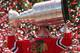 CHICAGO, IL - JUNE 28: Bryan Bickell #29 of the Chicago Blackhawks kisses the Stanley Cup Trophy during the Blackhawks Victory Parade and Rally on June 28, 2013 in Chicago, Illinois. (Photo by Jonathan Daniel/Getty Images)